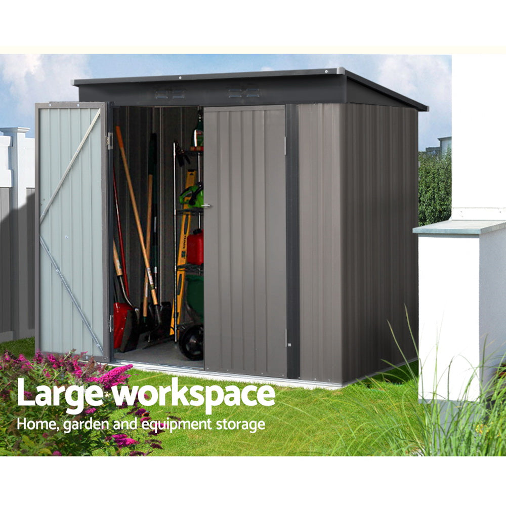 A small, grey Giantz Garden Shed 1.95x1.31M Sheds Outdoor Storage Steel Workshop House Tool Double Door with a slightly slanted roof and open double doors. Constructed from galvanized steel, it reveals a spacious interior perfect for storage. The shed is set against a plain background, offering robust weatherproof protection for your belongings.
