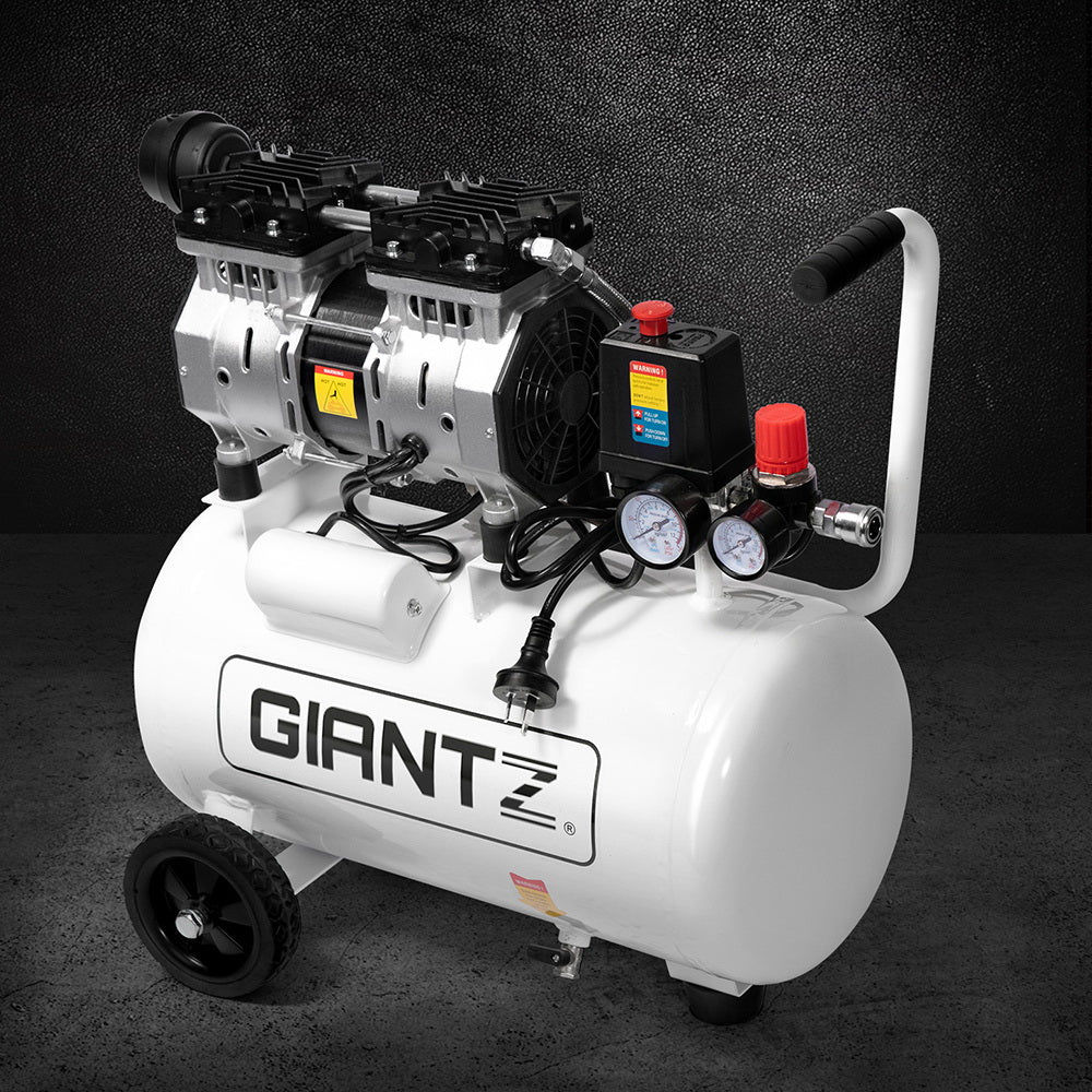 The Giantz 24L Air Compressor 40 L/min 115psi Oil-Free Electric Portable Inflator boasts a white cylindrical tank, black handle, and two wheels for portability. Equipped with dual gauges, pressure control knobs, and an electric motor, its oilless lubrication ensures ultra-quiet operation, making it perfect for various pneumatic tools.