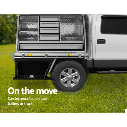 Two black **Giantz Steel Ute Tool Box Right Toolbox Under Tray Vehicle Storage Locks** are shown. One is closed, while the other is open, revealing a spacious, weather-resistant interior. The open lid is supported by two metal chains. Both heavy-duty steel boxes have a sleek, angular design for storage or organizing tools and accessories.