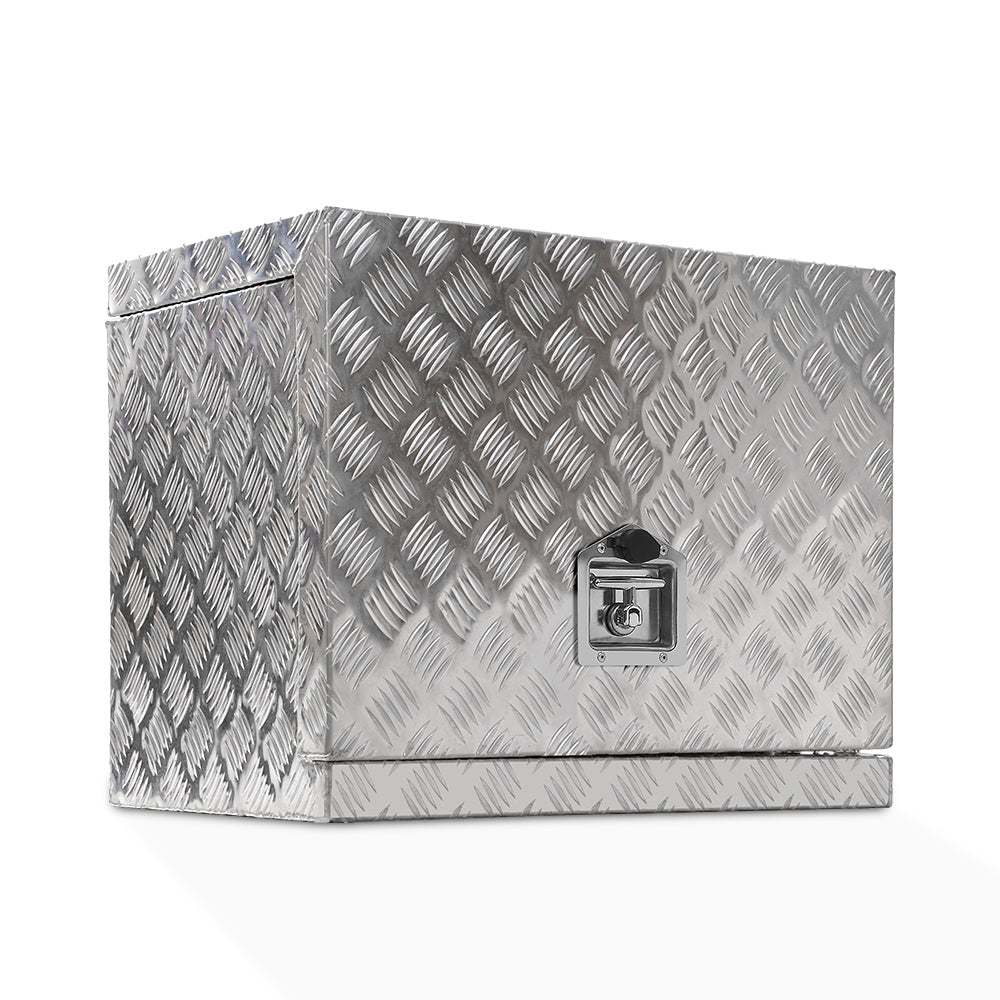 A durable aluminium tool box, this metallic, cube-shaped storage solution features a textured, diamond-plate surface. It has a secure latch at the front for locking. Reflecting light effortlessly, it's built to withstand heavy-duty or industrial use, making it an ideal Giantz Aluminium Ute Tool Box Generator Trailer Truck Storage Lock.