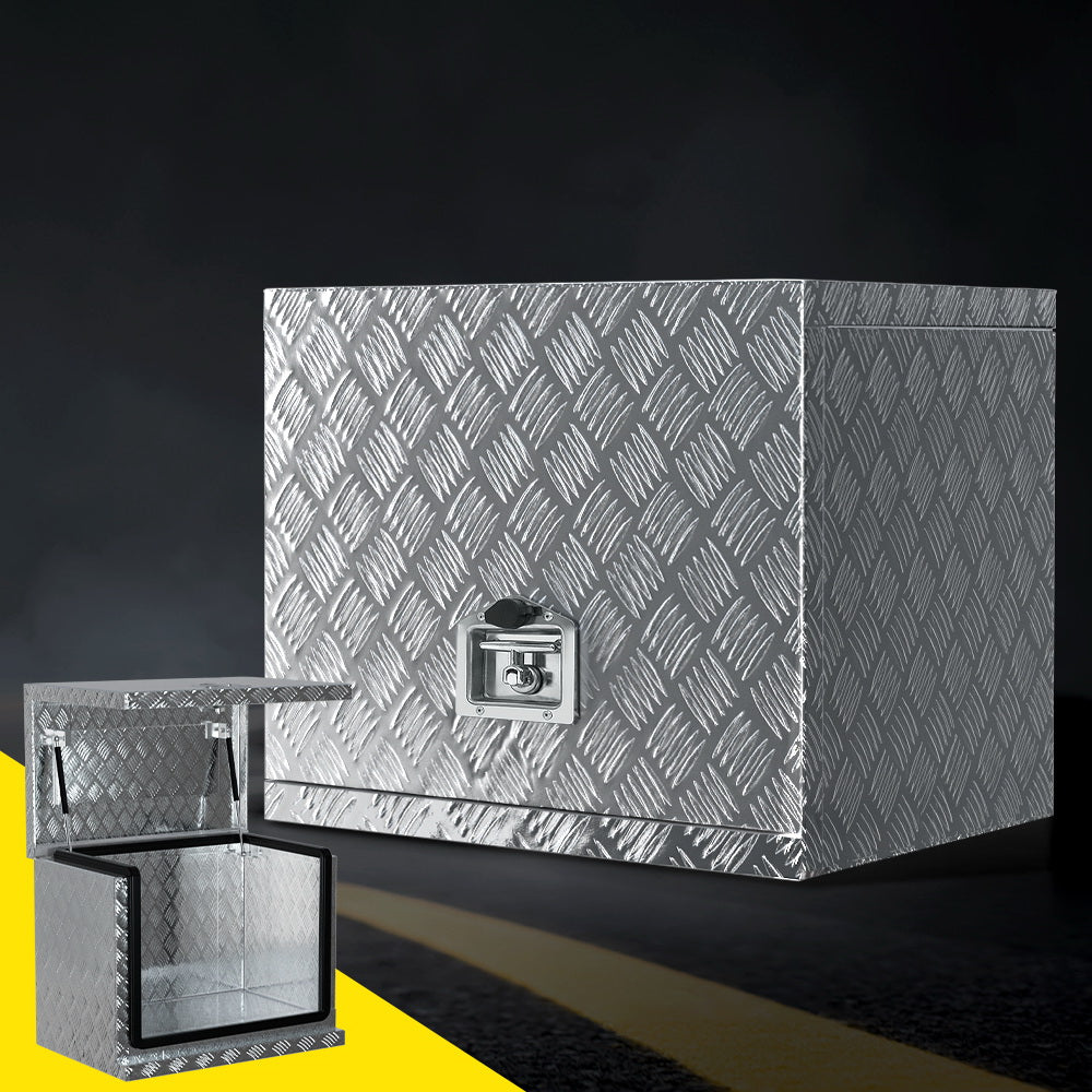 A large silver Giantz Aluminium Ute Tool Box Under Tray Heavy Duty Vehicle Chest Storage with a diamond plate pattern and a lockable latch on the front. This weather-resistant toolbox is shown closed, set against a plain white background.