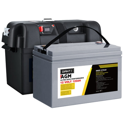 A gray deep cycle 120Ah 12V battery labeled "Giantz AGM Deep Cycle Battery 12V 120Ah Box Portable Solar Caravan Camping" is pictured in front of a black battery box. Featuring AGM technology, the battery has a handle on top for easy carrying. Text and safety symbols are visible on the label, highlighting its deep discharge recovery capability.