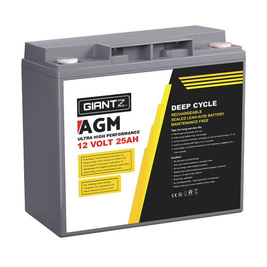 Image of a Giantz AGM Deep Cycle Battery 12V 25Ah Box Portable Solar Caravan Camping. The label reads, "Ultra High Performance, 12 Volt 25AH, Rechargeable Sealed Lead-Acid Battery, Maintenance Free." This advanced battery utilizes AGM technology for reliable portable power. The grey casing has a black and yellow label with safety information and usage instructions.