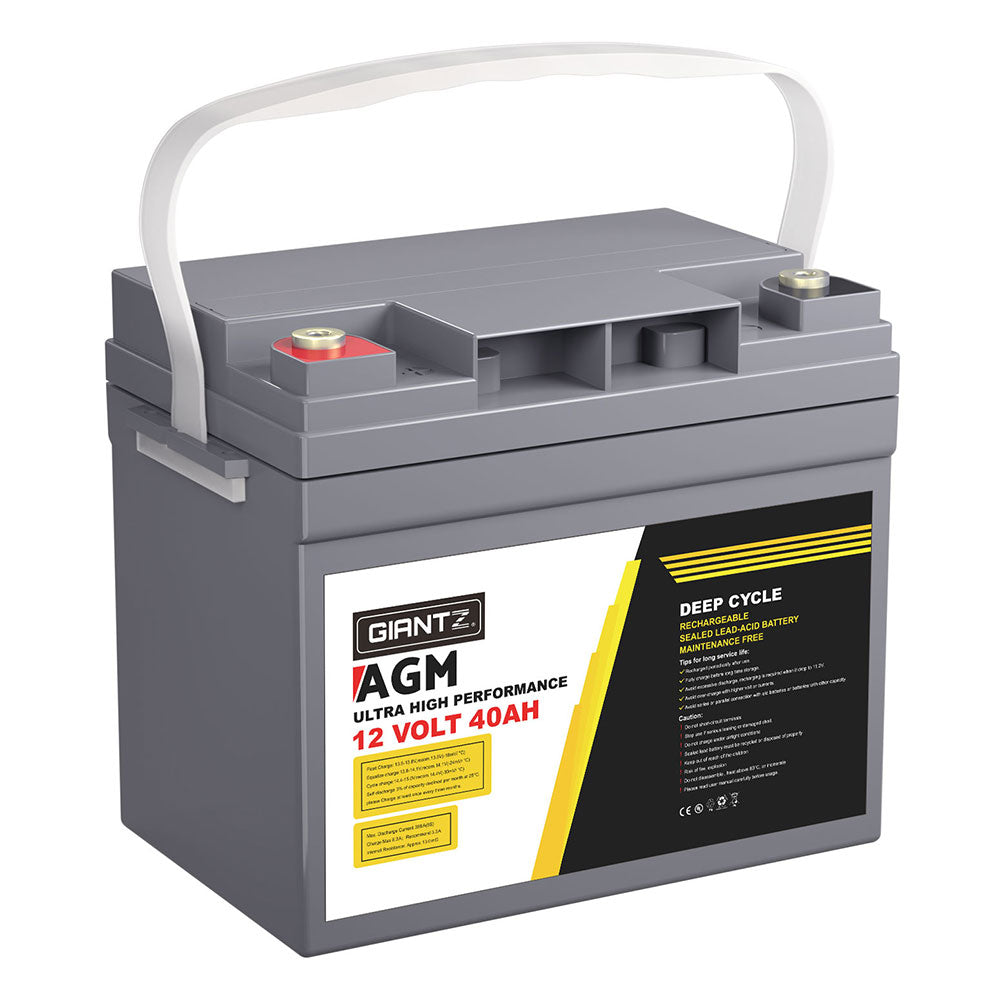 A gray Giantz AGM Battery 12V 40Ah Deep Cycle Box Portable Solar Caravan Camping with a white handle, rated at 12 volts and 40 ampere-hours (AH). This portable power source features red and black terminals and a detailed label on the front outlining its innovative AGM Technology and performance specs.