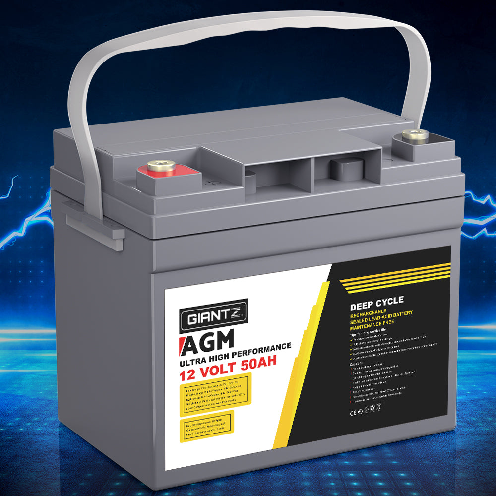 A gray Giantz AGM Deep Cycle Battery 12V 50Ah Box Portable Solar Caravan Camping with a white handle and yellow and red label indicating 12 volts and 50 amp-hours. Featuring advanced AGM technology, the "GIANTZ" brand name is displayed prominently. This portable power solution has two terminals on the top.