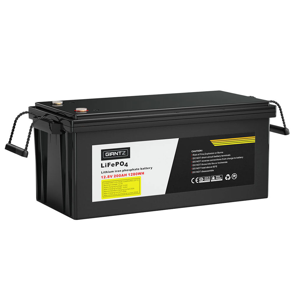 A black rectangular Giantz 12V 200Ah Lithium Battery LiFePO4 Deep Cycle Box Solar Caravan Camping, featuring two side handles and yellow text on the label. The label indicates a capacity of 12.8V 200Ah 12.02Wh and brand name "GIANTZ." Safety and technical information are also included, making it perfect for emergency power needs or as a car battery replacement.