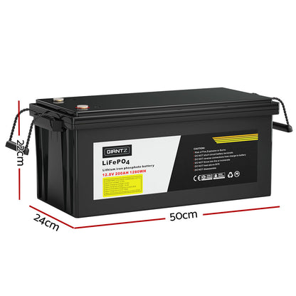 A black rectangular Giantz 12V 200Ah Lithium Battery LiFePO4 Deep Cycle Box Solar Caravan Camping, featuring two side handles and yellow text on the label. The label indicates a capacity of 12.8V 200Ah 12.02Wh and brand name "GIANTZ." Safety and technical information are also included, making it perfect for emergency power needs or as a car battery replacement.