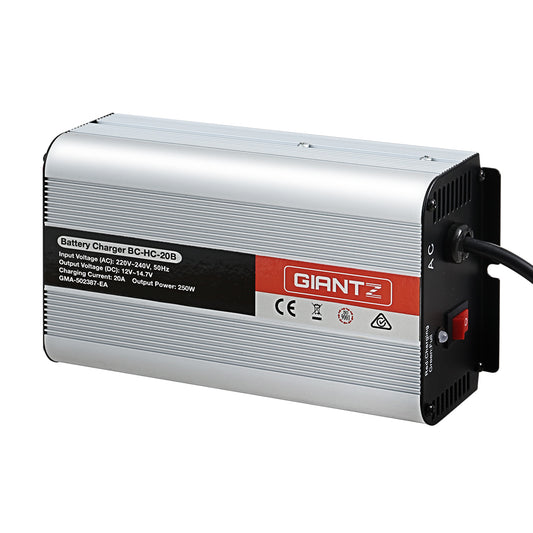 A high-performance Giantz 12V 20A Car Battery Charger Inverter 20 Amp ATV 4WD Boat Caravan in silver, designed with ventilation slots on the sides and a red on/off switch on the front. The label indicates an input voltage of 220-240V, charge voltage of 120V-145V, suitable for charging a 12V battery with an output power of 250W.