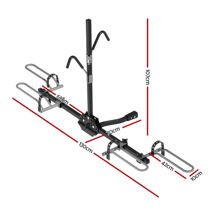 The Giantz 2 Bicycle Bike Carrier Rack Car 2" Hitch Mount Platform Foldable Black is a black hitch-mounted bike rack with two sets of wheel holders and frame support arms. Designed for a 2-inch hitch receiver, it features adjustable straps for securing the bikes and a central support column for added stability when attached to the rear of your vehicle.