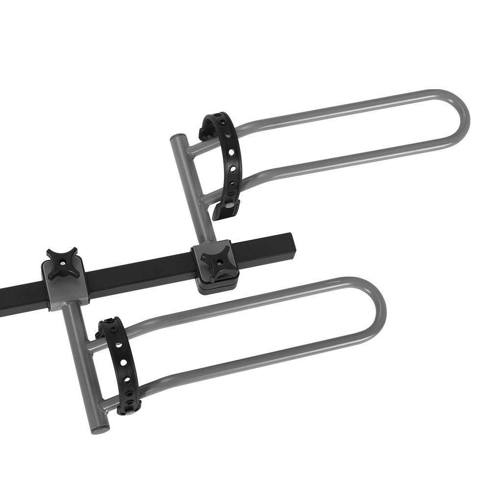 The Giantz 2 Bicycle Bike Carrier Rack Car 2" Hitch Mount Platform Foldable Black is a black hitch-mounted bike rack with two sets of wheel holders and frame support arms. Designed for a 2-inch hitch receiver, it features adjustable straps for securing the bikes and a central support column for added stability when attached to the rear of your vehicle.