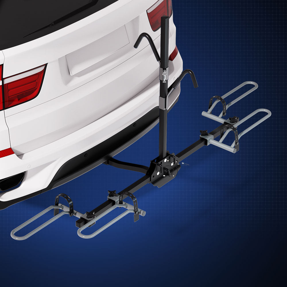 The Giantz 2 Bicycle Bike Carrier Rack Car 2" Hitch Mount Platform Foldable Black is a black hitch-mounted bike rack with two sets of wheel holders and frame support arms. Designed for a 2-inch hitch receiver, it features adjustable straps for securing the bikes and a central support column for added stability when attached to the rear of your vehicle.