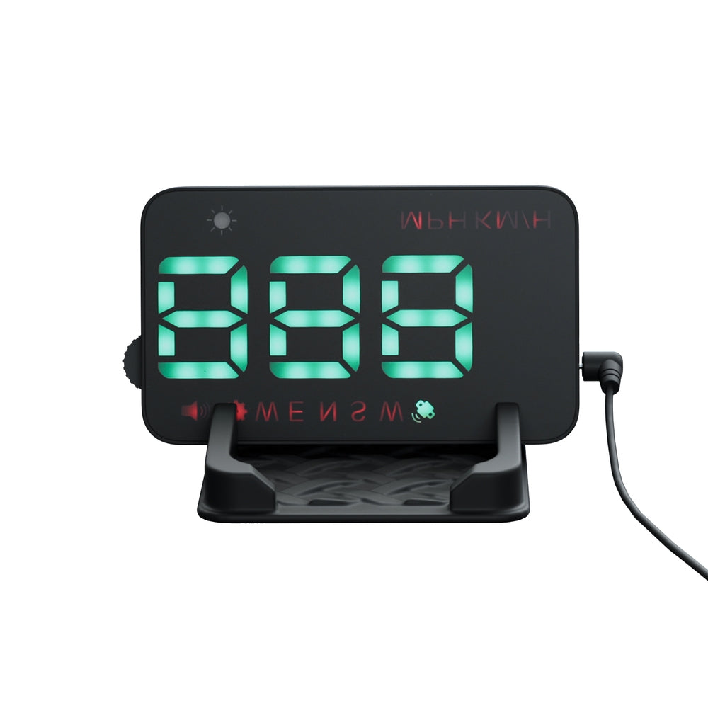 A black Giantz Universal Car Digital GPS Speedometer HUD Display Overspeed Warning Alarm 2 Modes with green LED numbers displayed upside down, reflected on the stand. The clock features icons for brightness adjustments and a red temperature display at the top, resembling a GPS HUD speedometer. A power cord is plugged into the side of the clock's stand.