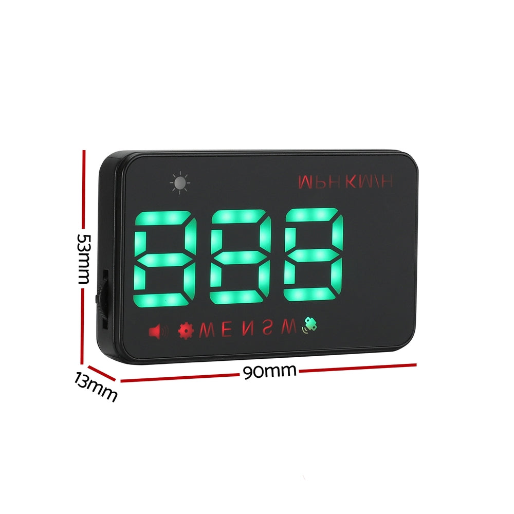 A black Giantz Universal Car Digital GPS Speedometer HUD Display Overspeed Warning Alarm 2 Modes with green LED numbers displayed upside down, reflected on the stand. The clock features icons for brightness adjustments and a red temperature display at the top, resembling a GPS HUD speedometer. A power cord is plugged into the side of the clock's stand.