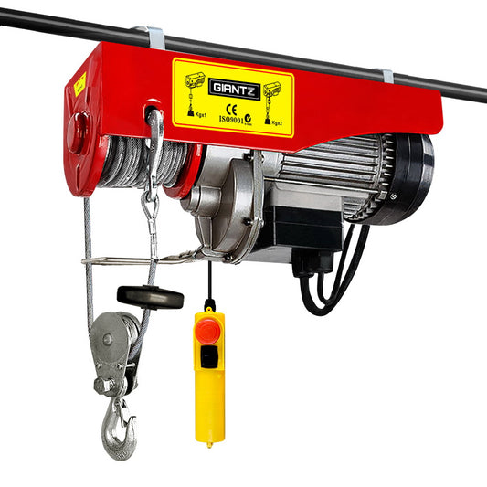 A red and silver Giantz Electric Hoist Winch 125/250KG Cable 18M Rope Tool Remote Chain Lifting with a high tensile cable and hook, mounted on a metal bar. The hoist has a yellow control box with a black button hanging from it. Branded "GIANTZ," it features a 510W motor, is marked with load capacity details, and holds CE certification.