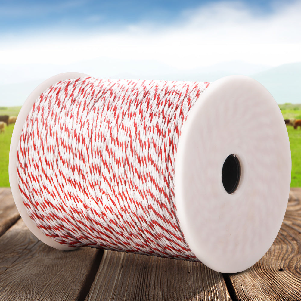 A Giantz Electric Fence Poly Wire 500M Insulator, perfect for livestock fencing. The string is neatly wound around the spool, which is white with a central black hole. The combination of colors creates a striped pattern. The spool is positioned at an angle, showcasing the texture ideal for electric fence setups.