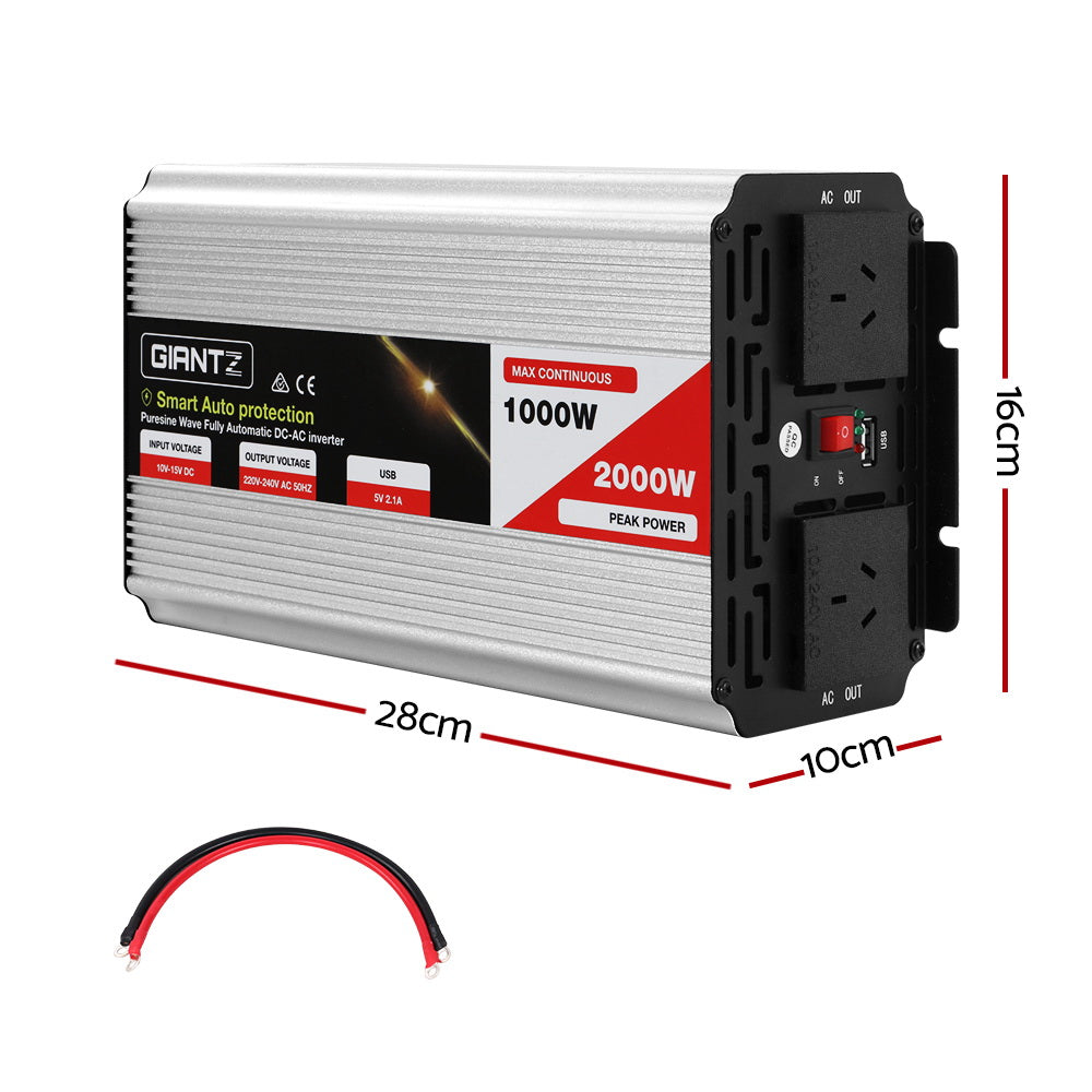 The image shows a dual-outlet Giantz Power Inverter 1000W or 2000W Pure Sine Wave 12V-240V Camping Boat Caravan with two sockets on the top, a red toggle switch in the center, and a USB port below it. The bottom half displays the rear side with two cooling fans, a positive terminal in red, and a negative terminal in black designed for 12V sources to power 240V appliances.