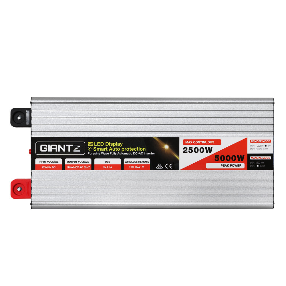 The image shows a silver-colored 2500W power inverter labeled "Giantz Power Inverter 12V to 240V 2500W/5000W Pure Sine Wave Camping Car Boat" with a LED display and specifications indicating 2500W max continuous power and 5000W peak power. The pure sine wave inverter includes switches, sockets, indicator lights, and supports wireless remote control on its black front panel.