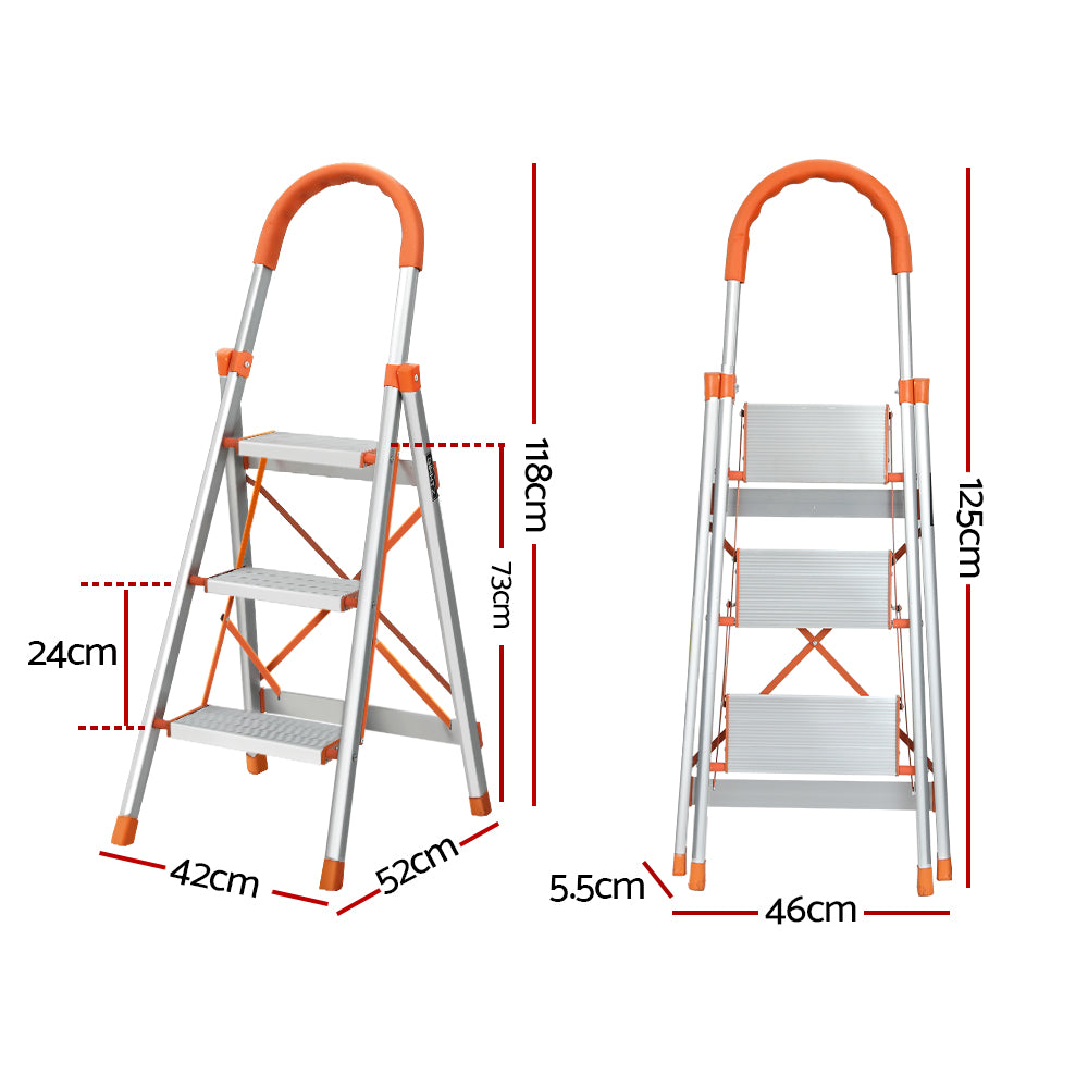 A Giantz 3 Step Ladder Multi-Purpose Folding Aluminium Light Weight Non Slip Platform, accented with orange on the steps, top railing, and foot pads. Designed for indoor use, it features non-slip rubber feet for stability and a handle at the top for added safety.