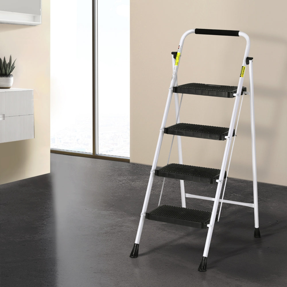 A white, four-step ladder with black steps and a black cushioned handle at the top. The Giantz 4 Step Ladder Multi-Purpose Folding Steel Light Weight Platform has non-slip rubber feet and steel construction, making it perfect for household use. It is freestanding and foldable for easy storage and portability.