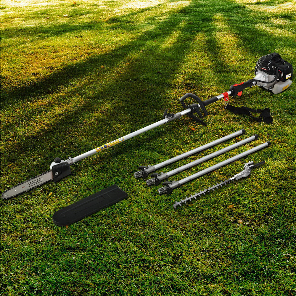 A multi-functional garden tool kit featuring the commercial-grade pro-series Giantz 62CC Pole Chainsaw Hedge Trimmer 12in Chain Saw 5.6m Long Reach with a long pole chainsaw and three extension attachments, including a hedge trimmer, various extendable tubes, and a protective blade cover. The tool has a gas-powered engine and a black shoulder strap for support.