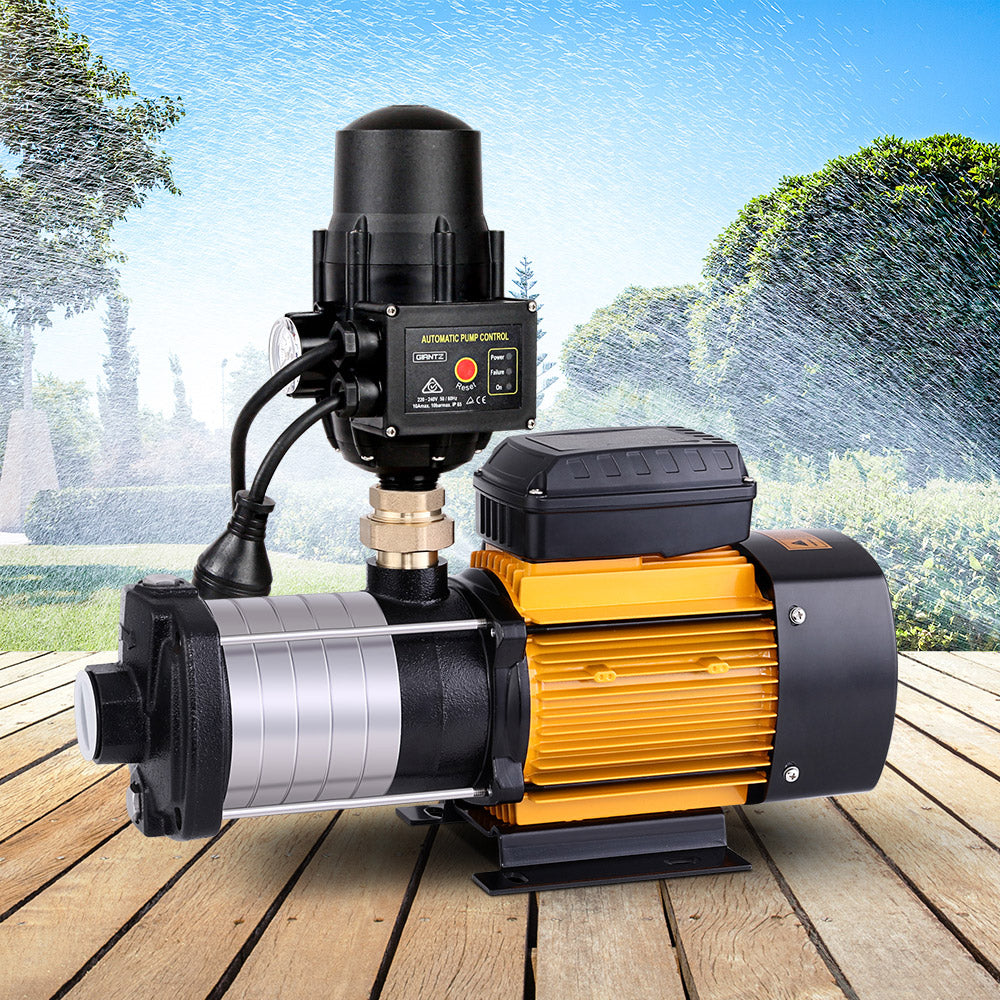 A Giantz Garden Water Pump High Pressure 2500W Multi Stage Tank Rain Irrigation Black with a yellow and black commercial motor body is shown. It includes attached components such as an automatic pump control unit with various switches and indicators, as well as connecting pipes and a mounting base.