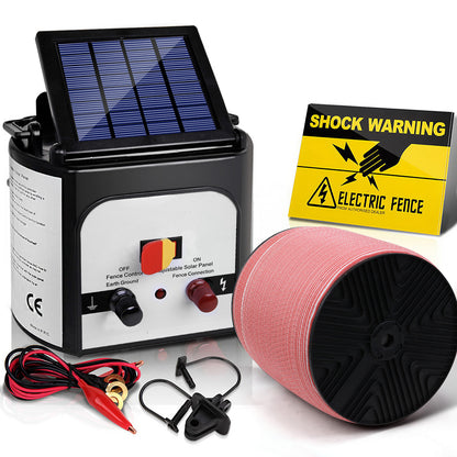 A Giantz Fence Energiser 8KM Solar Powered Electric 2000M Poly Tape kit includes a solar panel unit with control knobs, a roll of electrified wire, a yellow shock warning sign, and various accessories like leads and clips, ensuring reliable livestock protection.