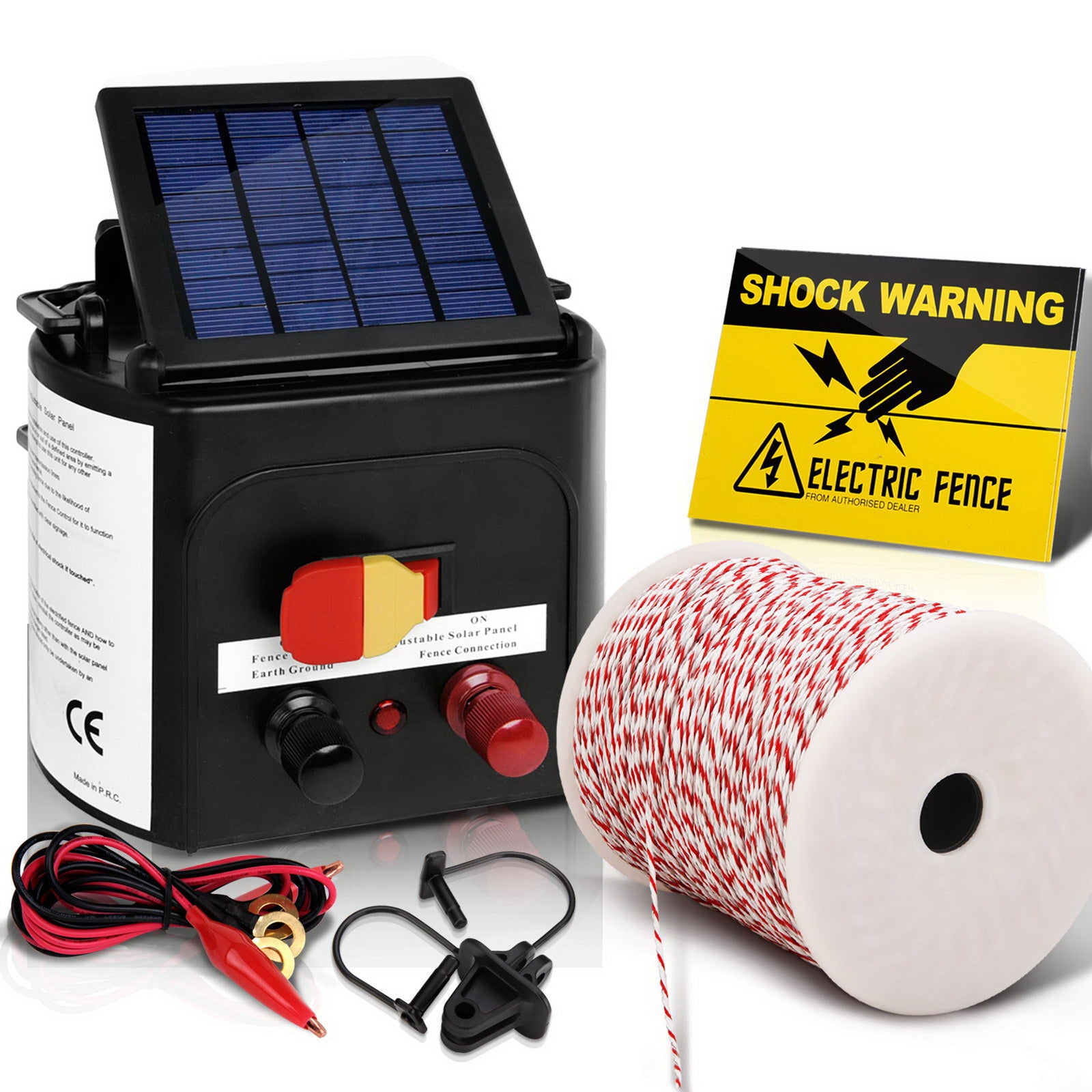 A Giantz Fence Energiser 3KM Solar Powered Electric 500M Poly Wire Insulator system is shown, including a solar panel unit, a spool of red and white wire, alligator clips, and various accessories for low maintenance livestock containment. A warning sign reading "Shock Warning Electric Fence" with a hand graphic is also visible.