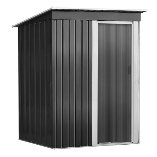 A modern, small black Giantz Garden Shed 1.62x0.86M Sheds Outdoor Storage Tool Workshop House Shelter Sliding Door with a silver-colored door and trim. Constructed from galvanized steel, it features a slanted roof and vertical ridges along the walls and door, designed for weatherproof outdoor storage. The slightly open door offers a glimpse of the interior.