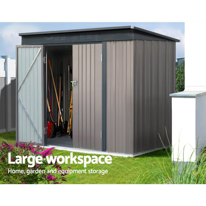 The Giantz Garden Shed 2.31x1.31M Sheds Outdoor Storage Tool Metal Workshop Shelter Double Door is a small, brown storage solution made of galvanized steel. It features a slanted roof and partially open double doors that reveal an empty interior. The shed has vertical ridges on the panels and is elevated on a framed base, with the white background highlighting its design perfectly for garden storage.