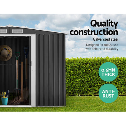 A black galvanized steel Giantz Garden Shed 2.58x3.14M w/Metal Base Sheds Outdoor Storage Workshop Shelter Sliding Door with open double doors reveals the empty interior. The weatherproof shed has side ventilation panels near the roofline and a gabled roof. It offers an ideal storage solution for outdoor equipment and tools.