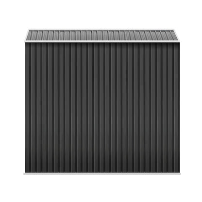 A plain black corrugated metal wall, made from galvanized steel, features a vertical ribbed pattern and a matching flat roof. The Giantz Garden Shed 2.6x3.9M w/Metal Base Sheds Outdoor Storage Workshop Tool Shelter Sliding Door facade is minimalistic and industrial, with no windows or doors visible. The entire weatherproof structure appears boxy and utilitarian, reminiscent of a metal garden shed.