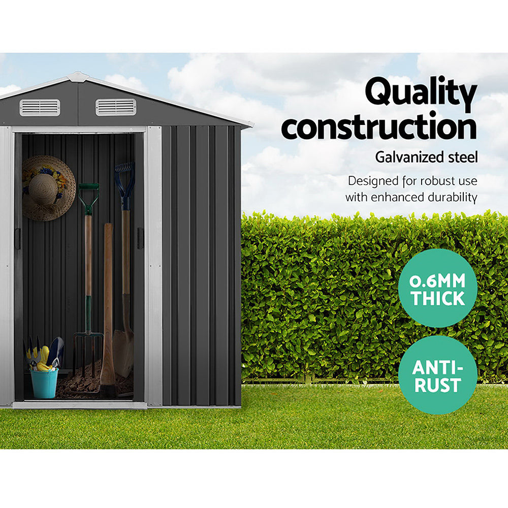 Image of a Giantz Garden Shed 1.96x1.32M Sheds Outdoor Storage Tool Workshop Metal Shelter Sliding Door in black with white trim. The weatherproof shed features double doors, two small vents near the roof, and various dimensions labeled in red: height 186cm, front width 132cm, back width 196cm, door height 154cm, door width 73cm, depth 119cm, and total width 184cm.