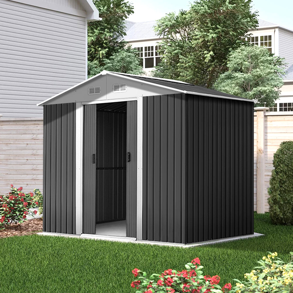 A weatherproof, gray Giantz Garden Shed 2.58x2.07M Sheds Outdoor Storage Workshop Metal Shelter Sliding Door constructed from galvanized steel with a ridged roof and vertical corrugated panels on the sides, viewed from the front against a white background.