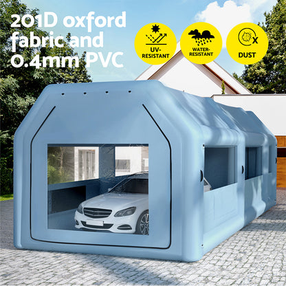 Image of a Giantz Inflatable Spray Booth 10X5M Car Paint Tent Filter System 2 Blowers, a large, blue, rectangular tunnel-like structure with transparent windows on the sides and front. Made from high-quality 201D oxford cloth, it has a flat base and is designed to appear modular, potentially used for transport, storage, or scientific purposes.