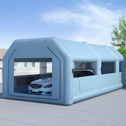 A light blue, rectangular, enclosed Giantz Inflatable Spray Booth 8.5X4.6M Car Paint Tent Filter System 2 Blowers with transparent windows on the side and front. The structure appears to be made of sturdy material and has a roof with a slight arch. The design is modern and minimalistic, featuring an electric inflation blower for quick setup.