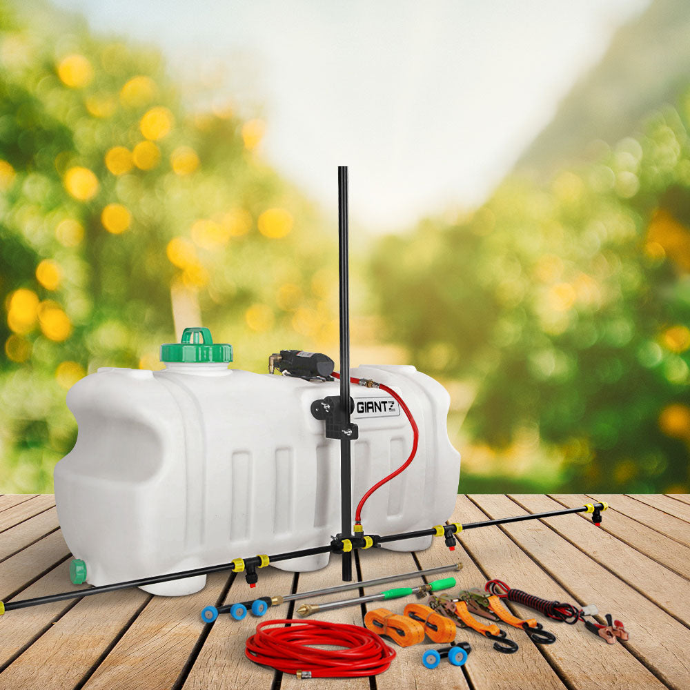 Image of a white agricultural sprayer tank with a green cap and black pump attached to a metal spraying boom. The Giantz Weed Sprayer 100L 1.5M Boom Garden Spray setup includes various accessories, such as spray nozzles, tubing, and straps, laid out neatly around the weed sprayer.