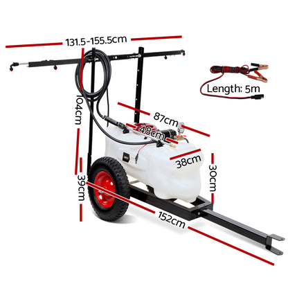 Image of a heavy-duty trailer-mounted white pull-behind lawn sprayer with a red wheeled frame. It features a large white tank, black spray arms, and coiled hoses attached to a 12V pump. The Giantz Weed Sprayer 60L Trailer 1.5M Boom Garden Spray is designed for attachment to a vehicle for easy application of lawn treatments.