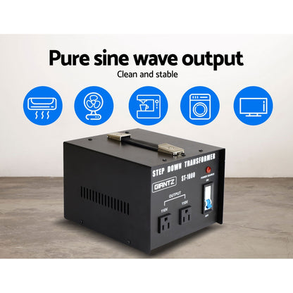 Black step-down transformer labeled "Giantz 1000 Watt Step Down Transformer." It features two 110V output sockets, a power switch, and a red power indicator light. The unit also includes a metal carrying handle on top and ventilation slots on the side. Perfect for those needing a reliable 1000W voltage converter.