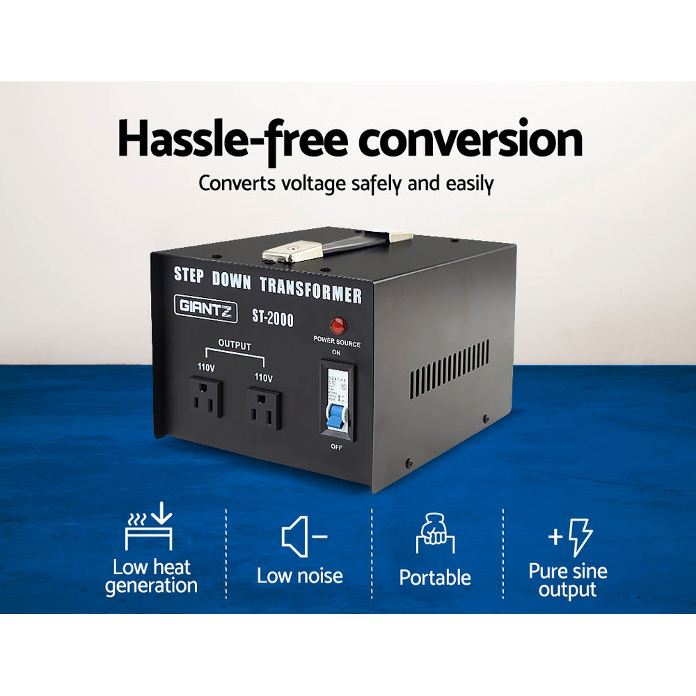 An image of a Giantz 2000 Watt Step Down Transformer, placed on a blue surface. The text highlights features like low heat generation, low noise, portability, and pure sine output. With its 2000 watt capacity and the tagline "Hassle-free conversion," it ensures safe and easy voltage conversion.