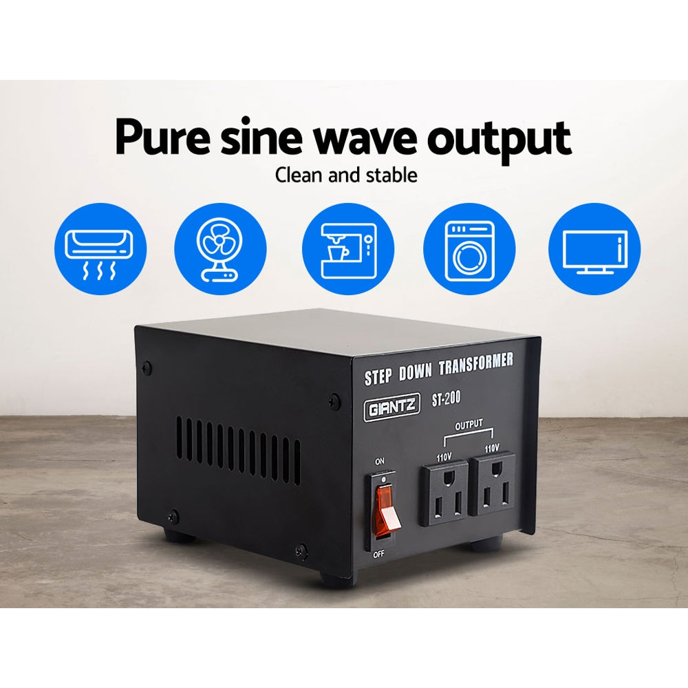 Image of a black Giantz Step Down Transformer 200W 240V TO 110V Stepdown Voltage Converter AU-US with the model number "ST-200" displayed. It has an on/off switch, two 110V output sockets, and features such as low heat generation, low noise, bonus fuse, pure sine output, and converts 240V to 110V written around it.