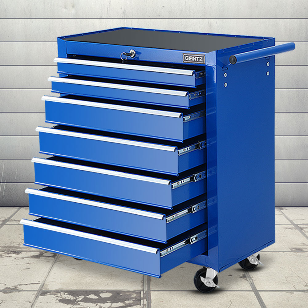 A blue, durable steel tool chest with six drawers, some of which are partially open, and a handle on the right side. This Giantz 7 Drawer Tool Box Cabinet Chest Trolley Storage Garage Toolbox Blue is on four casters—two swivel ones at the front for mobility—and features a lockable drawer system for secure storage.