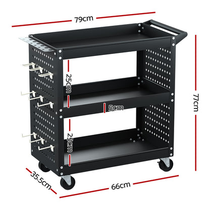 A black metal utility cart with three shelves, mounted on four caster wheels. The Giantz 3-Tier Tool Cart Storage Trolley Workshop Garage Pegboard Hooks Black features a handle at the top for easy movement, and pegboard sides with hooks for its side pegboard tool hanging system and screwdriver storage bay.