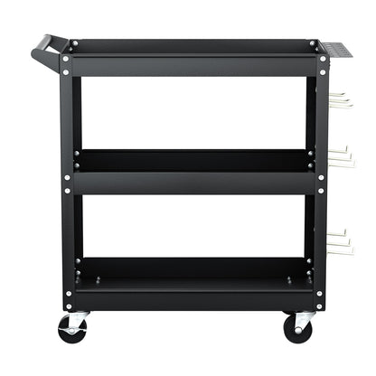 A black metal utility cart with three shelves, mounted on four caster wheels. The Giantz 3-Tier Tool Cart Storage Trolley Workshop Garage Pegboard Hooks Black features a handle at the top for easy movement, and pegboard sides with hooks for its side pegboard tool hanging system and screwdriver storage bay.