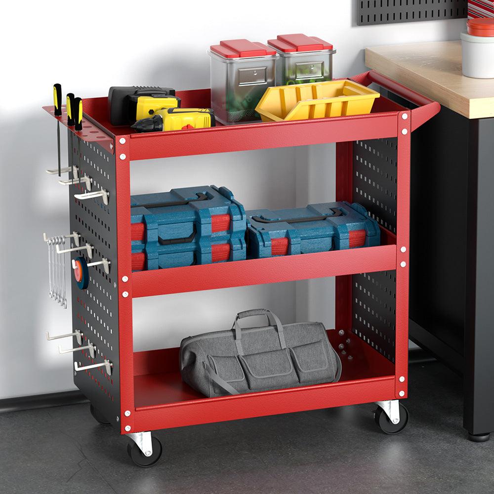 The Giantz 3-Tier Tool Cart Storage Trolley Workshop Garage Pegboard Hooks Red is a red and black, three-shelf utility cart with a handle and caster wheels. Featuring pegboard panels on the sides for a side pegboard tool hanging system, this cart is perfect for organizing tools and supplies. It even includes a screwdriver storage bay for added convenience.