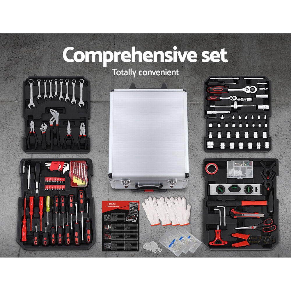 A Giantz 786pcs Tool Kit Trolley Case Mechanics Box Toolbox Portable DIY Set on wheels with an extended handle is open, revealing organized chrome vanadium tools. Separate compartments contain wrenches, pliers, screwdrivers, bits, sockets, a saw, hex keys, and measuring tape, all neatly arranged in molded black trays.