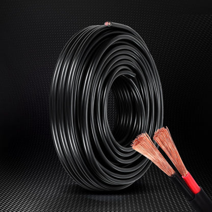 A coiled spool of Giantz 2.5MM 10M Twin Core Wire Electrical Cable Extension Car 450V 2 Sheath is shown. The close-up view highlights the two copper wire strands with red and black insulation emerging from the cut end of the cable. The oxygen-free copper strands are untwisted, displaying their multitude of fine wires.