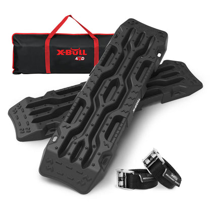 A pair of X-BULL Recovery Tracks Boards 12T Sand Snow Mud tracks 2PCS 4WD 4X4 Car Truck New with rugged grooves and handles for vehicle recovery. They are accompanied by two black straps with metal buckles and a black carrying bag with red handles and the text "X-BULL 4WD" written on it, perfect for off-road adventures.