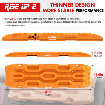 The image displays four orange X-BULL 4X4 Recovery Tracks Boards 4PCS Sand Mud Snow Tracks Car Truck 4WD RISEUP lined up vertically. At the bottom, there are two black carrying bags and four black leashes. The text at the top right reads, "4PCS RECOVERY TRACKS, 2X CARRY BAGS, 4X LEASHES." The X-BULL logo is shown top left.