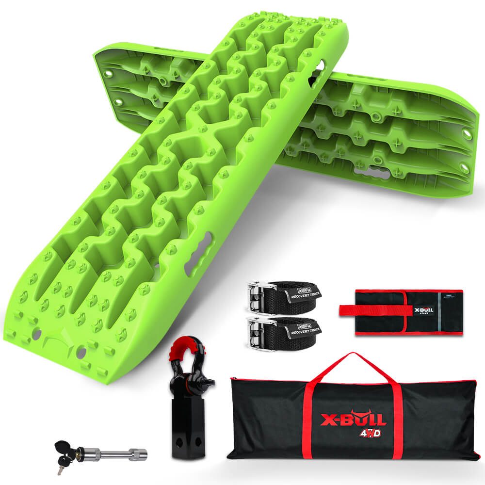 A set of X-BULL Hitch Receiver 5T Recovery Receiver With 2PCS Recovery tracks Boards Gen3.0 Green for off-road vehicles, arranged in an overlapping position. Accompanying accessories include two straps, a red and black carrying bag labeled "X-BULL 4WD," a mounting pin, a small black and red item, a wrench, and a high strength forged aluminum recovery hitch.