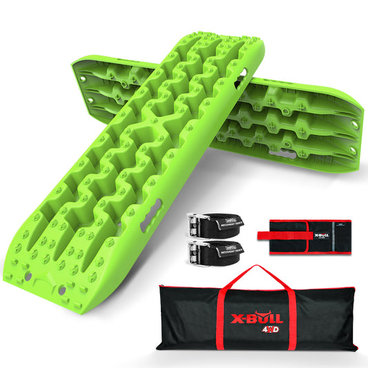 A set of X-BULL 2PCS Recovery Tracks Snow Mud Sand Truck With Carry bag Green is displayed. Crafted from durable nylon material, the package includes two U-shape design traction boards, two black straps with buckles, and a black storage bag with "X-BULL 4WD" printed in red and white.